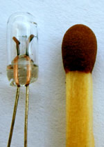 Miniature 5V 45mA filament lamp compared with a match head lamp-match.jpg