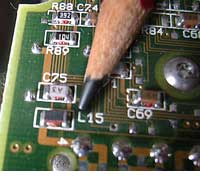 SMD inductor in a Hard Disk Drive. Typical values can be 0.1nH to 220nH smd-inductor.jpg